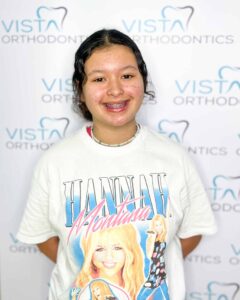 Girl with braces smiling for camera