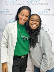 Girl posing with orthodontist