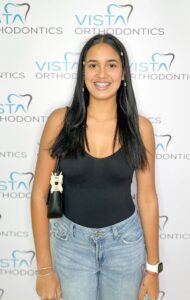 Girl with new braces smiling for camera